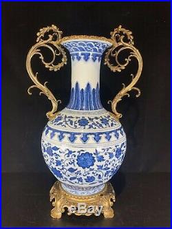 A Chinese Blue And White Porcelain Vase With Bronze Marked Qianlong