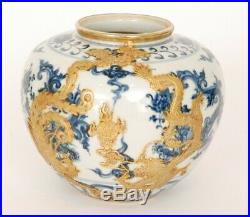 An antique Chinese blue and white porcelain dragon jar, Ming dynasty
