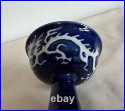 Blue ground white dragon porcelain stem cup. Yuan Dynasty