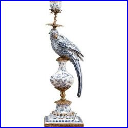 PORCELAIN IN BRONZE ORMOLU BLUE AND WHITE FLEUR FIGURAL BIRD CANDLESTICK right